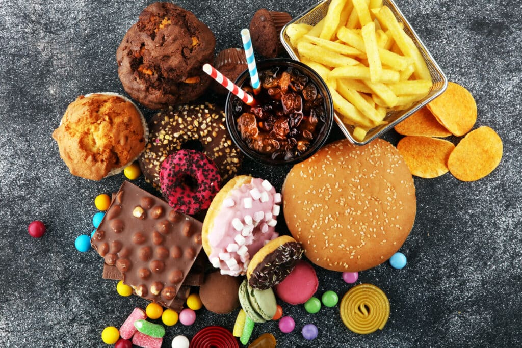 Pile of unhealthy foods that people crave and indulge in on vacation