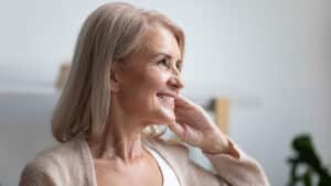 Happy and vibrant older woman who feels great with balanced hormones.