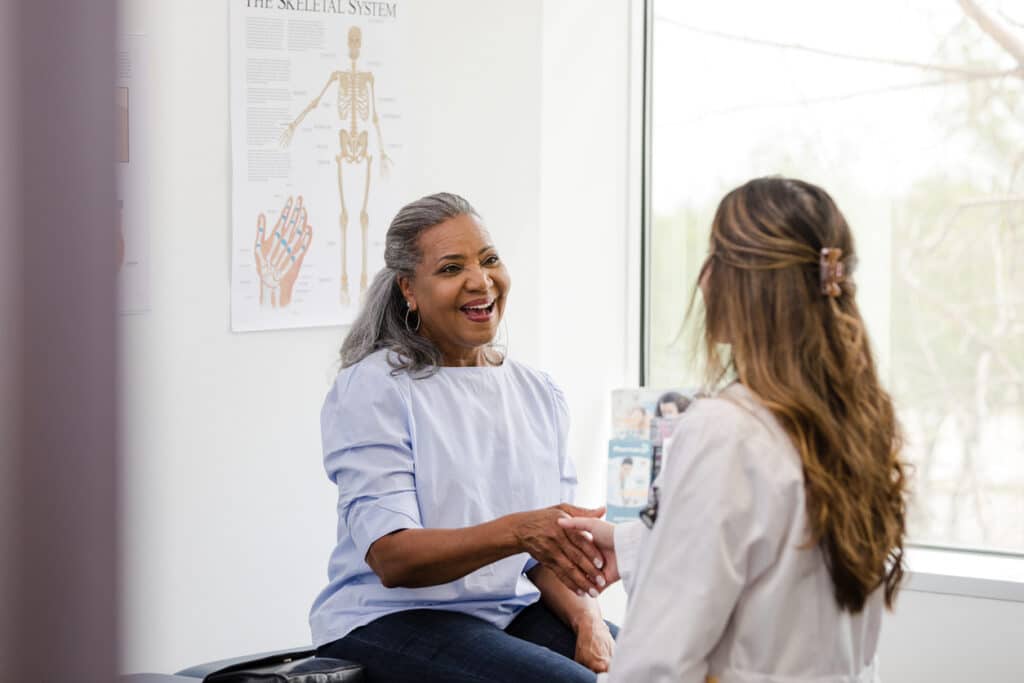 Patient discussing age-related changes and possible hormone imbalance with a healthcare provider.
